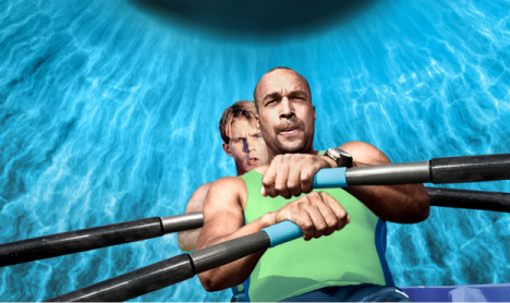 2 athletic men rowing in a row boat race